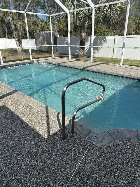 Pool deck in river rock