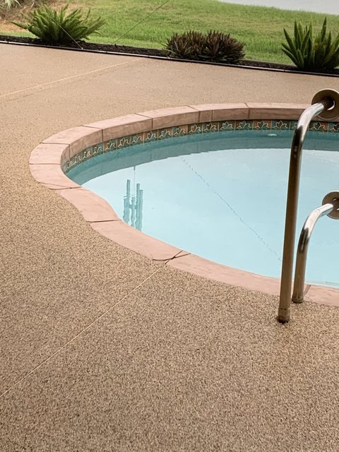 Pool deck in river rock