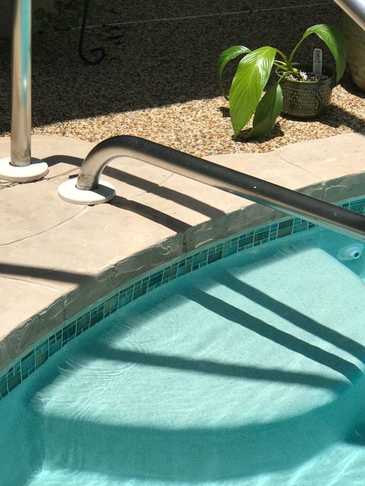 Pool deck in river rock