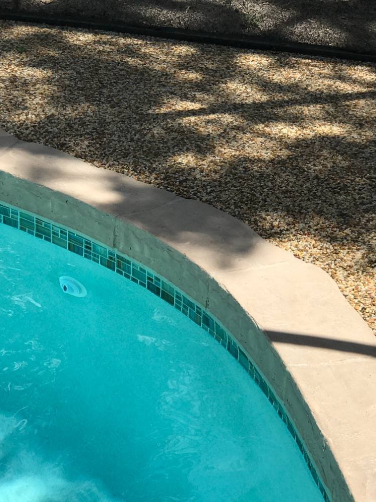 Pool deck in river rock