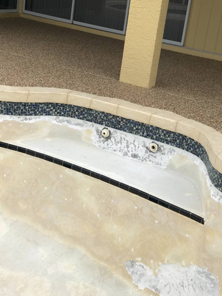 Pool deck in river rock
