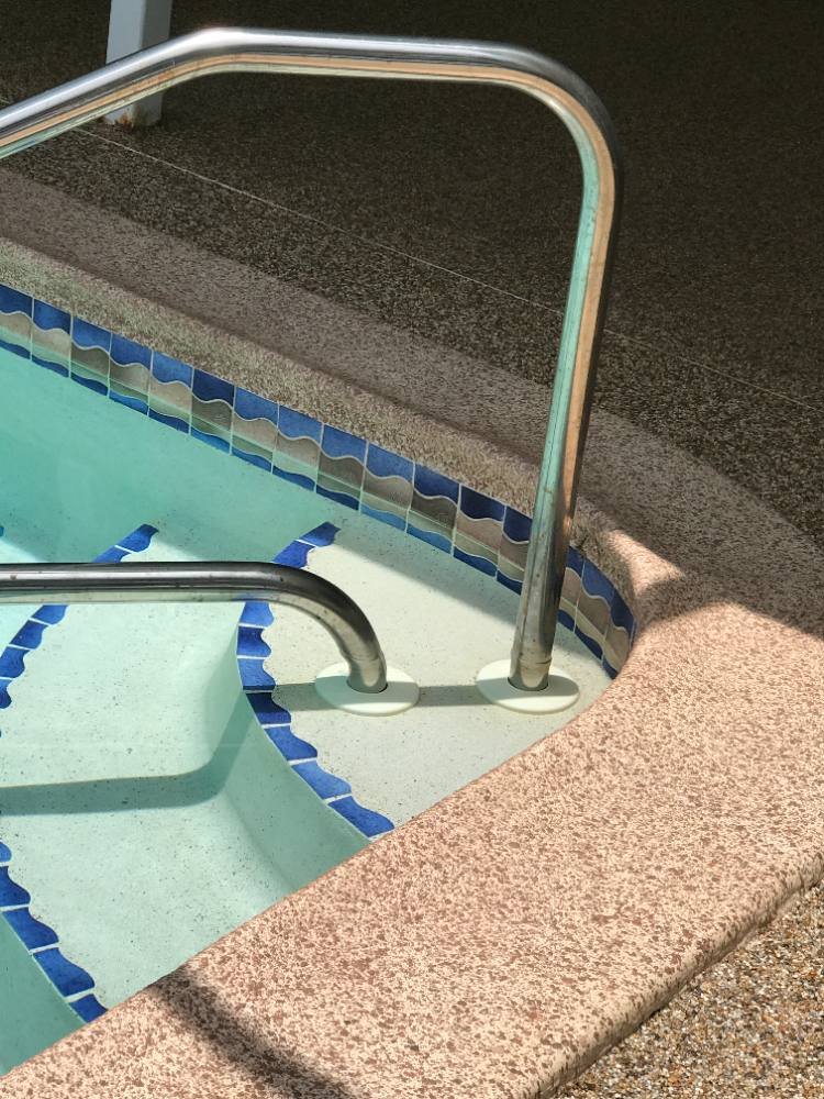 Pool deck in river rock