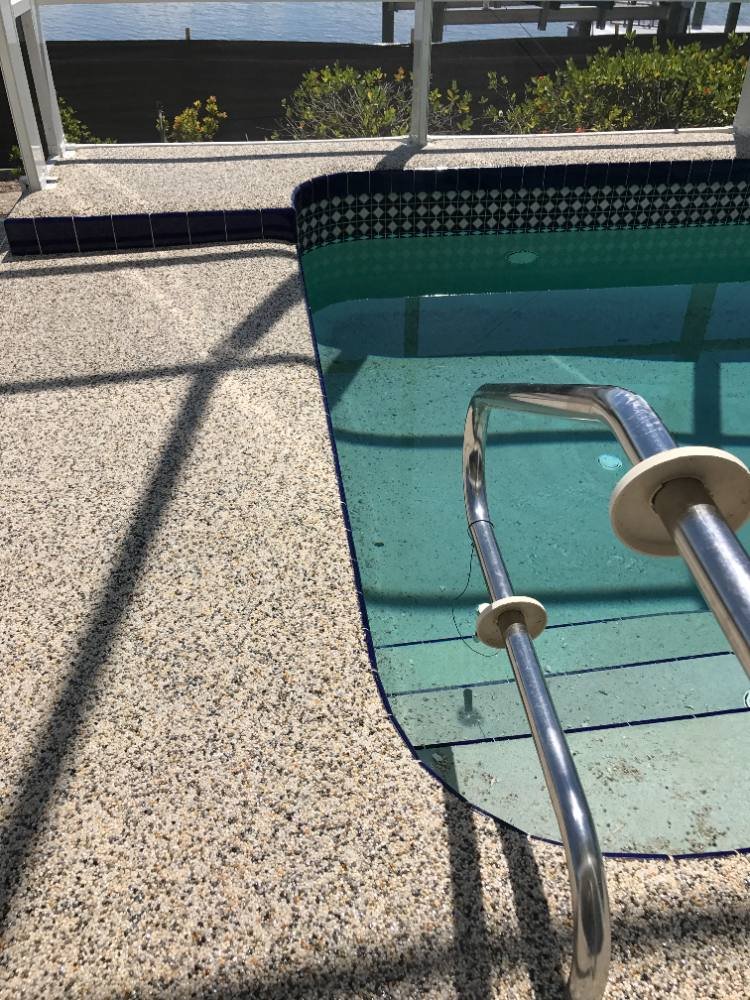 Pool deck in river rock