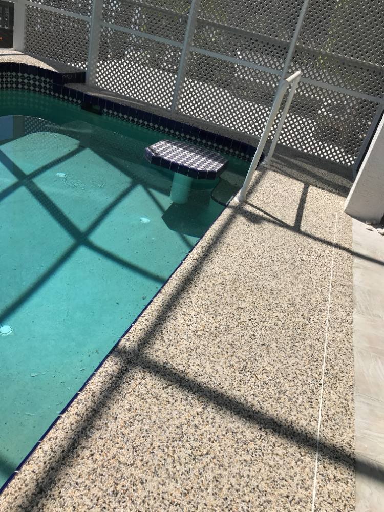 Pool deck in river rock