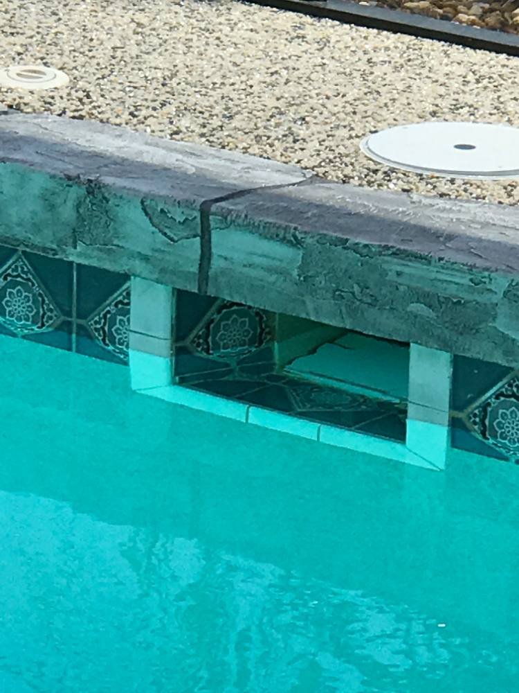 Pool deck in river rock
