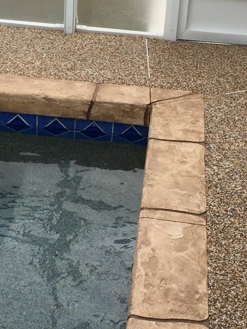 Pool coping in river rock